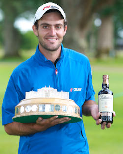Scottish Open Winner Edoardo Molinari with a bottle of Ballantine's 30 Year Old whisky