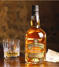 A bottle of Irishmas Single malt which is produced at the Irishman Distillery in Ireland